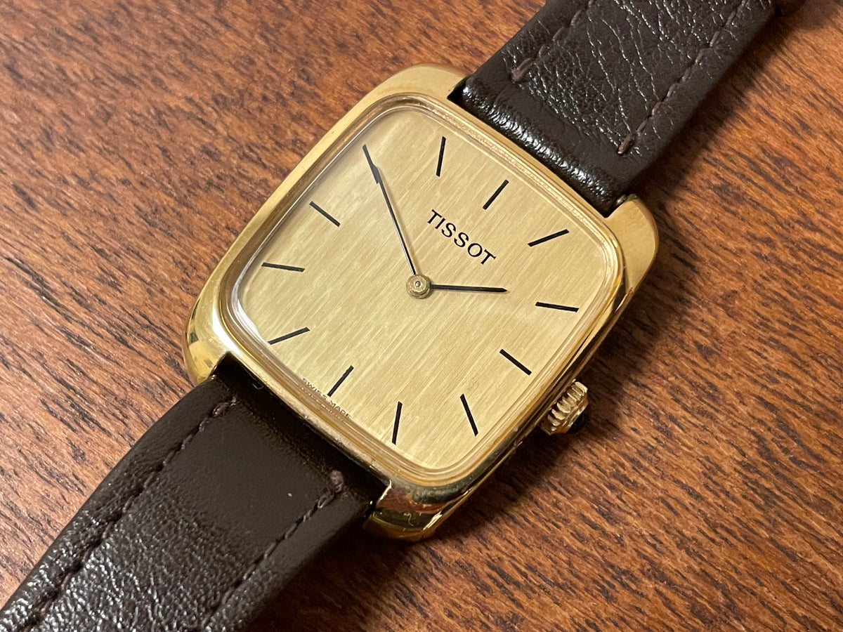 (1970s) Tissot 642-10778 Stylist dress watch - gold square case - gold brushed dial w/ gold stick markers - small size (NOS)