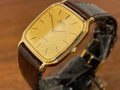 (1981) Seiko 5930-5509 Lassale dress watch - gold textured dial w/ gold stick markers (NOS)