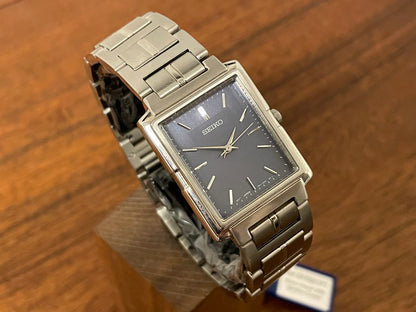 (1991) Seiko 7N01-5C90 - integrated bracelet - blue dial w/ silver markers (NOS)