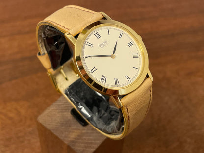 (1989) Seiko 5Y94-8000 dress watch - gold case - cream dial w/ black Roman numerals (NOS)