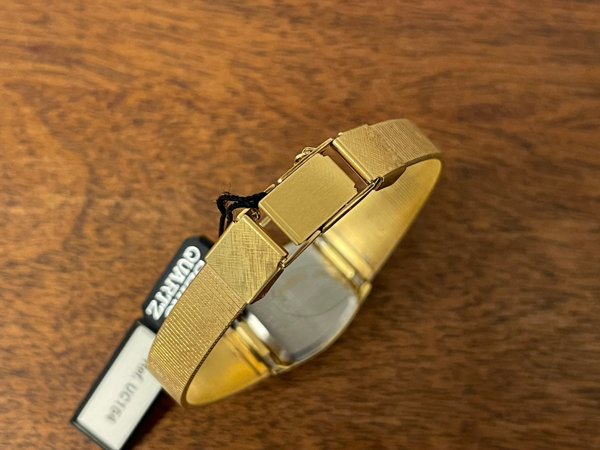 (1982) Seiko 5420-5160 - gold plated case w/ etched bezel - silver dial w/ gold markers - small size (NOS)