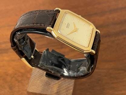 (1987) Seiko 5E20-5A00 "Tank" dress watch - champagne patterned dial w/ gold markers (NOS)