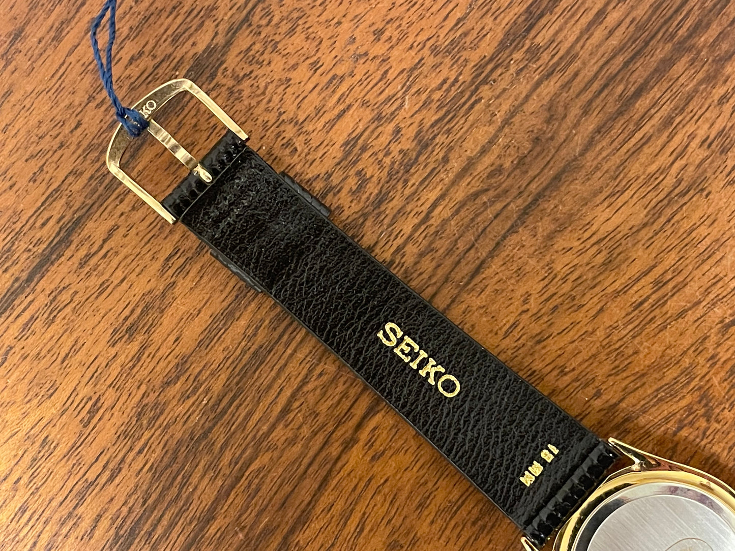 (1986) Seiko 7434-7000 dress watch with moon phase -silver dial w/ gold stick markers (NOS)