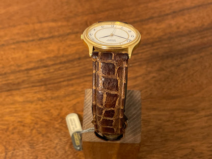 (2003) Seiko 7N01-7041 quartz dress watch - gold case w/ white dial & Arabic numerals (NOS)