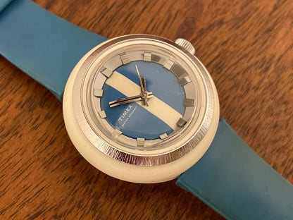 (1970s) Timex 290-181 UFO - white plastic case - blue & white dial w/ silver markers - small size (NOS + full set)