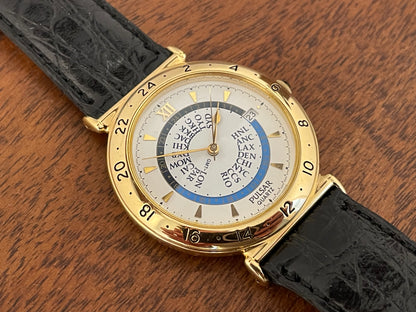 (1999) Pulsar V339-6000 world Timer - gold case - rotating white dial w/ gold markers (NOS)