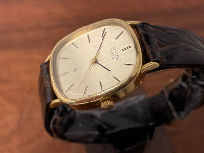 (1970s) Citizen 47-5181 "Ellipse" dress watch - 18K solid gold case - brushed champagne dial w/ gold markers