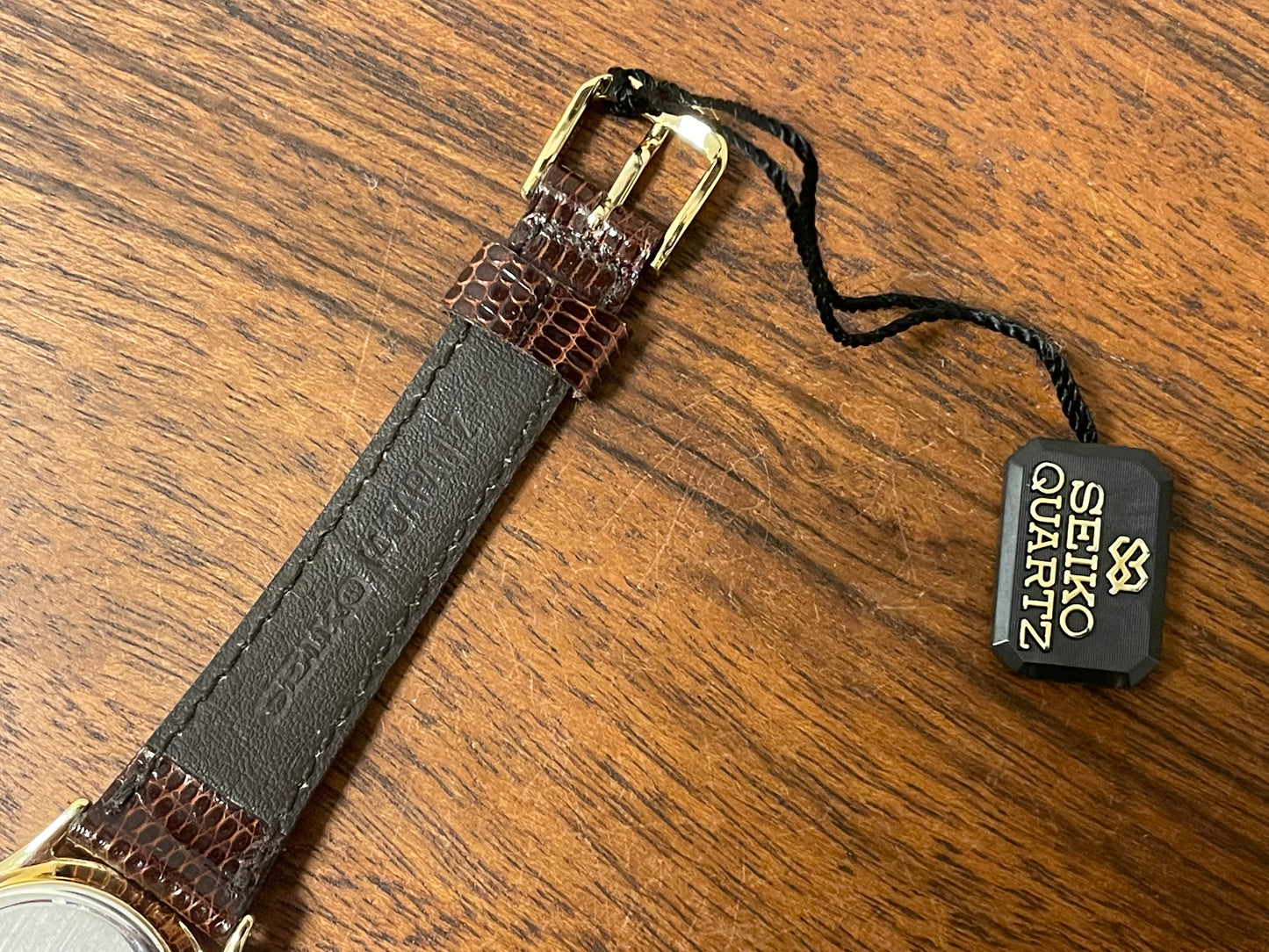 (1985) Seiko 2A24-0040 dress watch - champagne dial w/ moonphase & stick markers - small size (NOS)