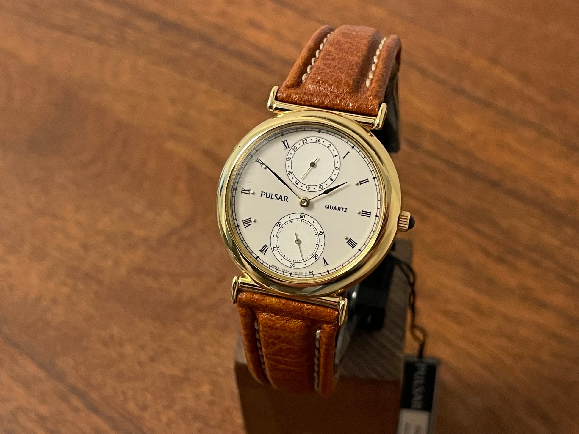 Front side (1998) Pulsar V254-0080 dress watch – white dial w/ Roman numerals, 24h subdial & small seconds (NOS)