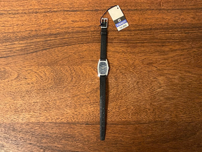 (1970s) Tissot HZ-10720 Stylist dress watch - silver tonneau case - blue brushed dial w/ silver stick markers - small size (NOS)