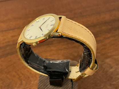(1989) Seiko 5Y94-8000 dress watch - gold case - cream dial w/ black Roman numerals (NOS)
