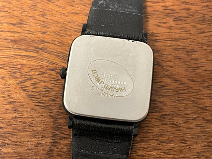(1983) ADEC (by Citizen) 2028-395808 "TV case" - black case - silver dial w/ black Arabic numerals (NOS)