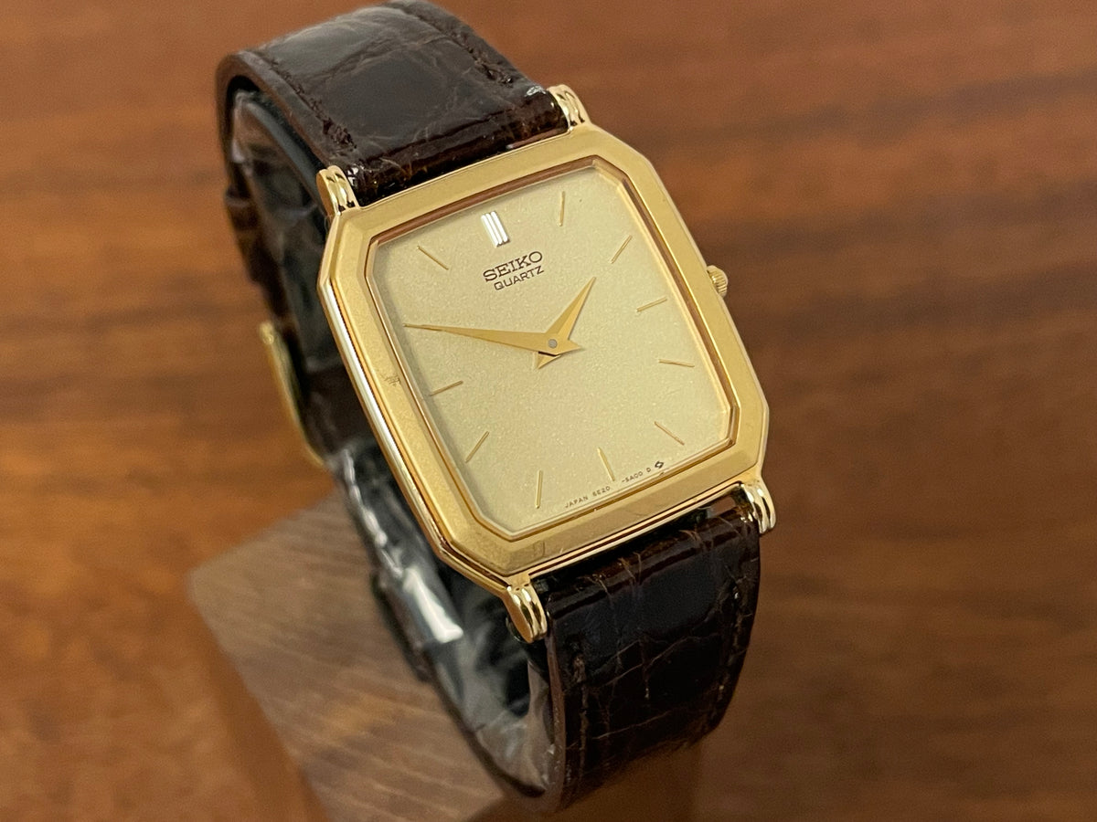 (1987) Seiko 5E20-5A00 "Tank" dress watch - champagne patterned dial w/ gold markers (NOS)