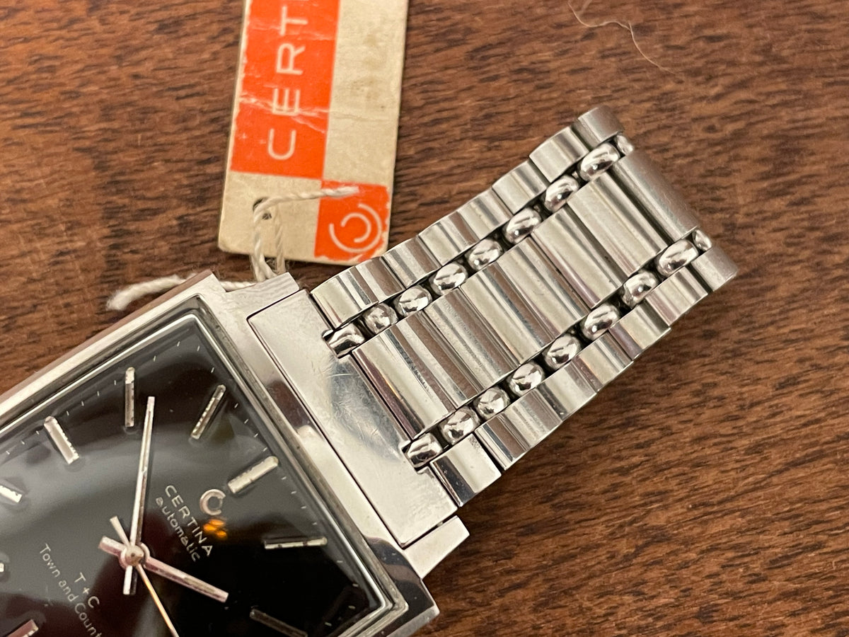 (1960s) Certina 5301.115 Town & Country - bracelet - square case - black dial w/ silver markers (NOS)