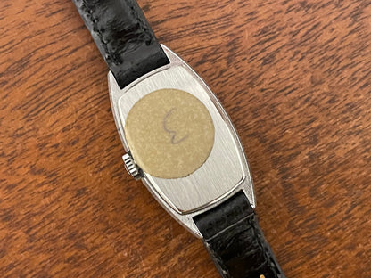 (1970s) Tissot HZ-10720 Stylist dress watch - silver tonneau case - blue brushed dial w/ silver stick markers - small size (NOS)