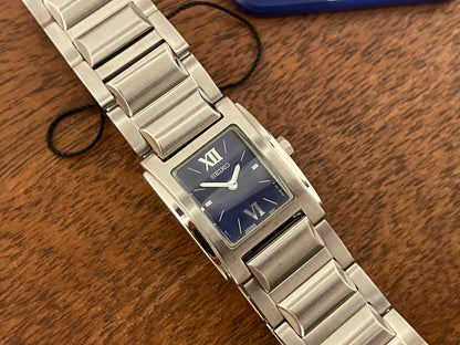 (1995) Seiko 1N00-OJH0 - "Tank" style case - blue dial w/ silver Roman numerals & markers - small size (NOS)