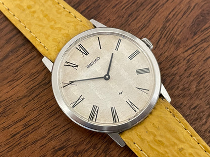 (1976) Seiko 2220-0180 Chariot dress watch - silver textured waffle dial w/ Roman numerals