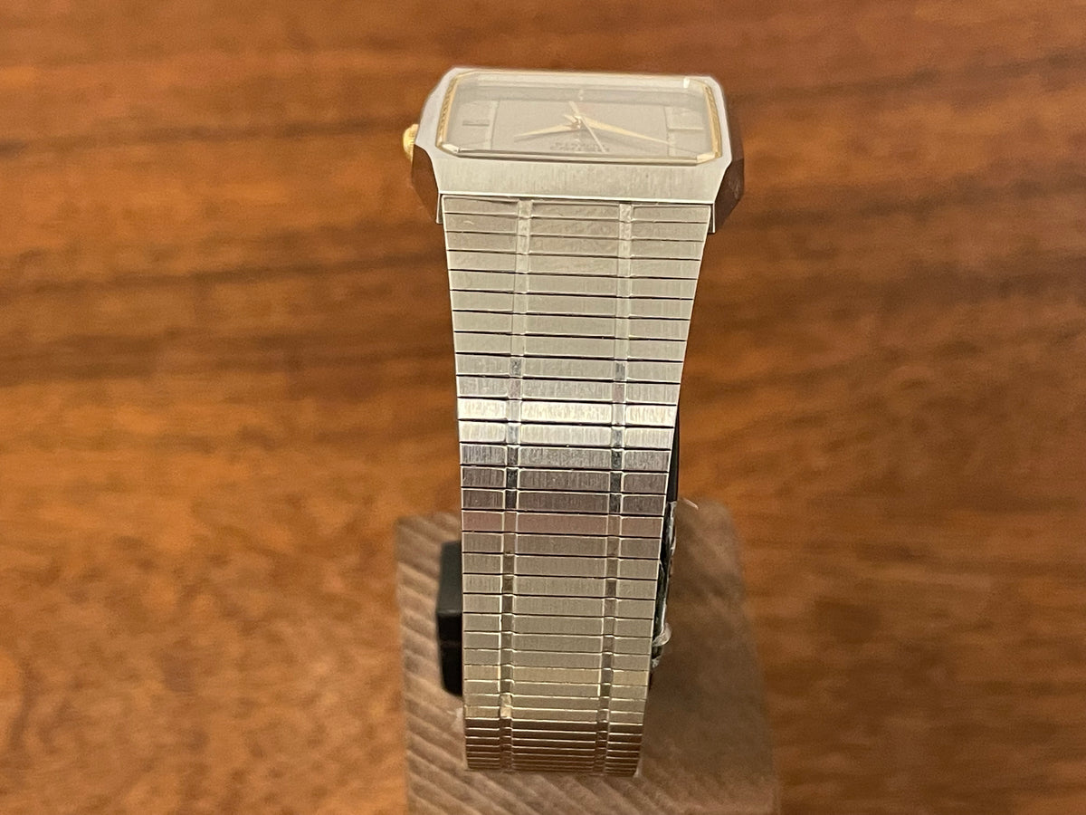 (1985) 5Y02-5010 Seiko 5 quartz - integrated bracelet - silver brushed dial w/ stick markers (mint)