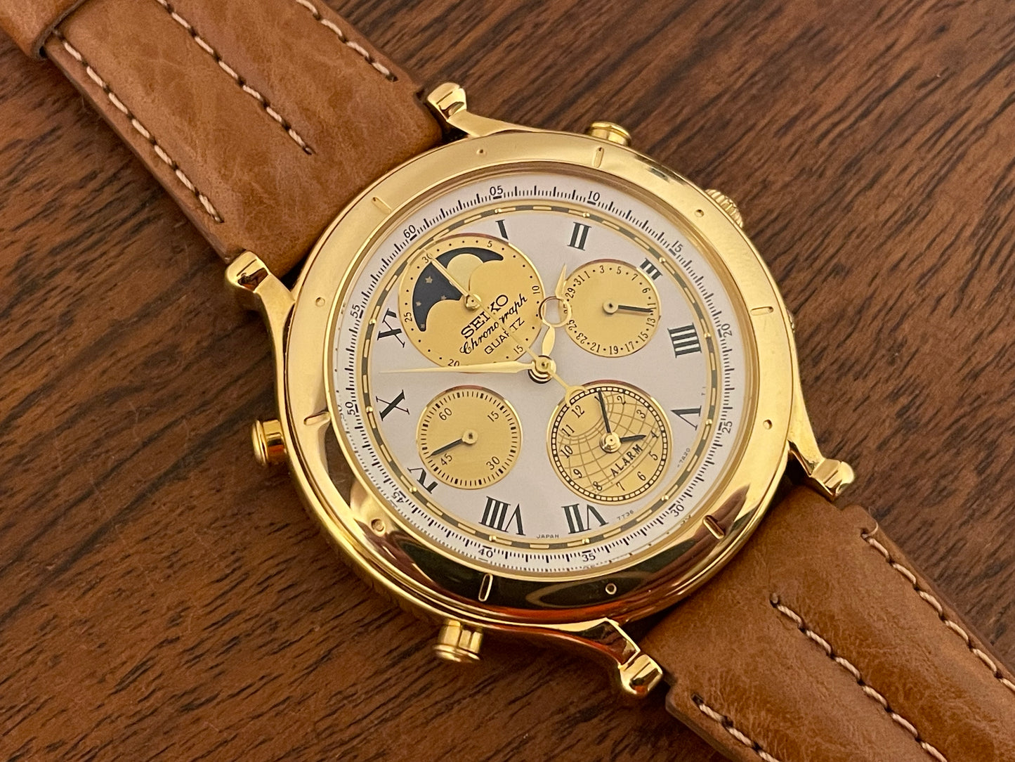 (1990) Seiko 7T36-7A10 Age of Discovery (AOD) chronograph - gold colored case - white dial w/ gold subdials & moonphase