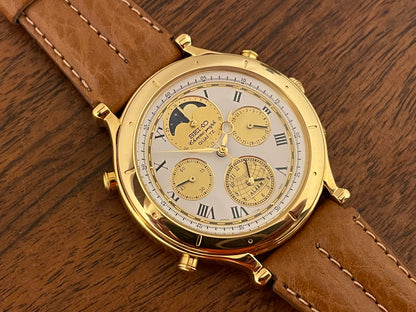 (1990) Seiko 7T36-7A10 Age of Discovery (AOD) chronograph - gold colored case - white dial w/ gold subdials & moonphase