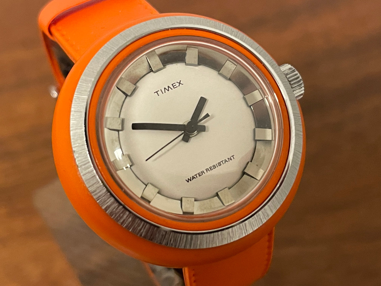 (1970s) Timex 290-181 UFO - orange plastic case - white dial w/ silver markers - small size (NOS + full set)
