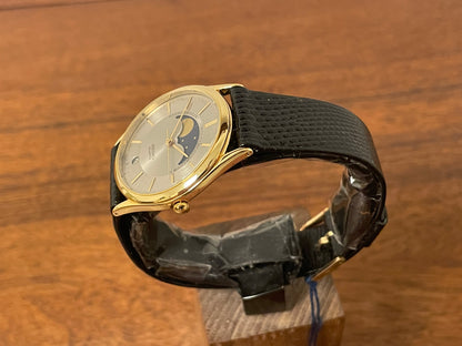 (1986) Seiko 7434-7000 dress watch with moon phase -silver dial w/ gold stick markers (NOS)