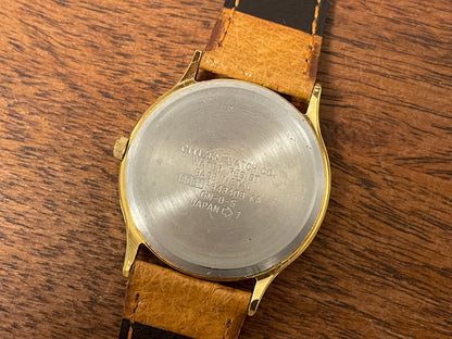 (1980s-1990s) Citizen "Fuji Television" logo dress watch - creme dial w/ black Arabic numerals