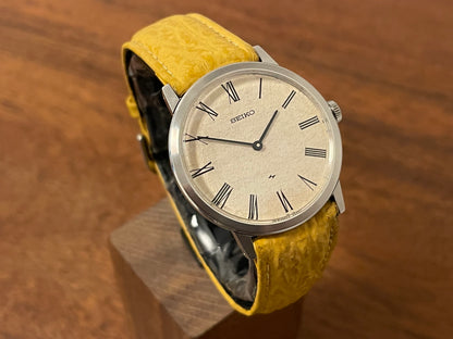 (1976) Seiko 2220-0180 Chariot dress watch - silver textured waffle dial w/ Roman numerals