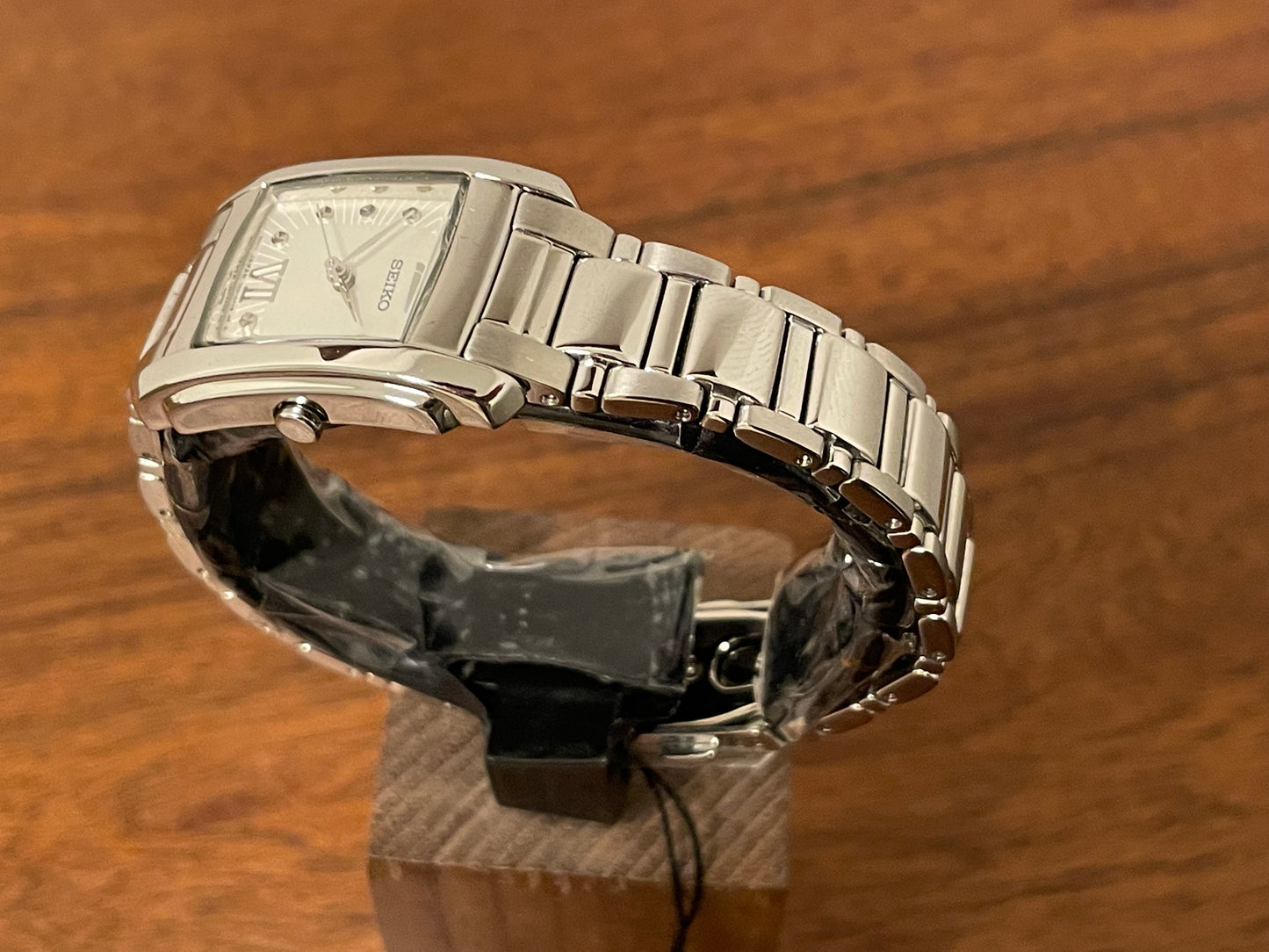 (1999) Seiko 7N01-0FW0  - "Tank" style case - silver dial w/ silver Roman numerals - small size (NOS)