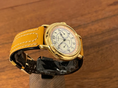 (1988) Pulsar V336-7040 dress watch - gold colored case - creme dial w/ Arabic numerals