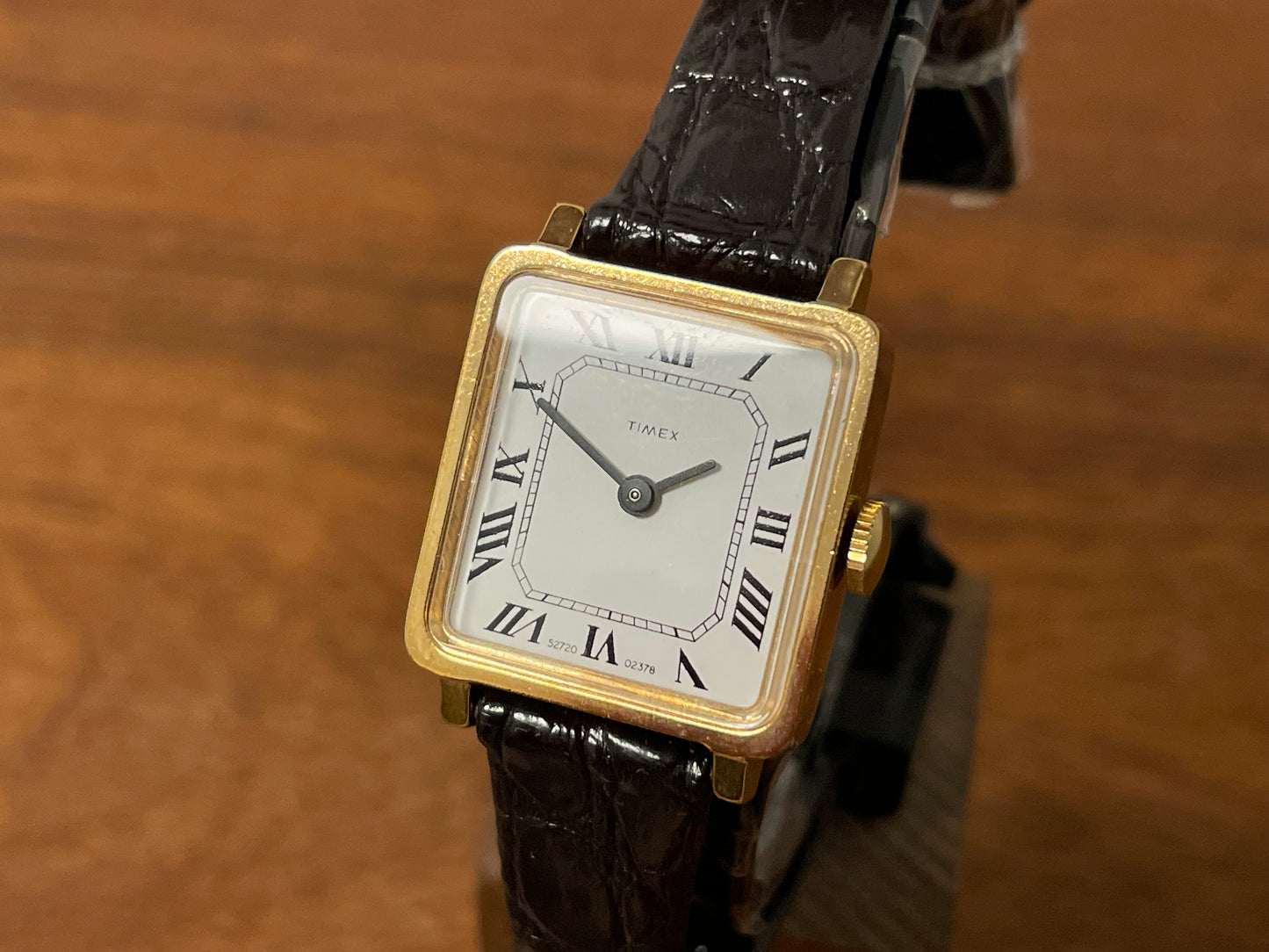 (1970s) Timex 527-201 "Tank" dress watch - gold case - white dial w/ Roman numerals - small size (NOS + Full set)
