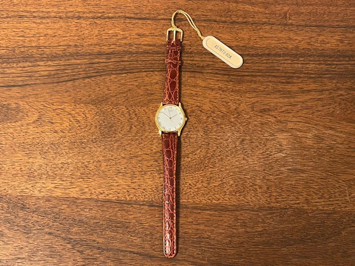 (1981) Citizen 6031-S38419 dress watch - white dial w/ gold Roman numerals - small size (NOS)