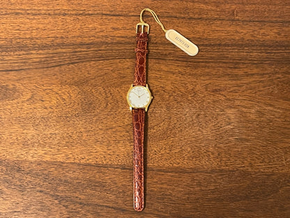 (1981) Citizen 6031-S38419 dress watch - white dial w/ gold Roman numerals - small size (NOS)