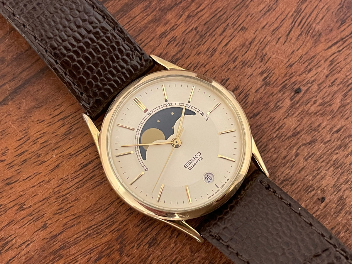 (1984) Seiko 7434-7000 dress watch - champagne dial w/ moonphase & stick markers