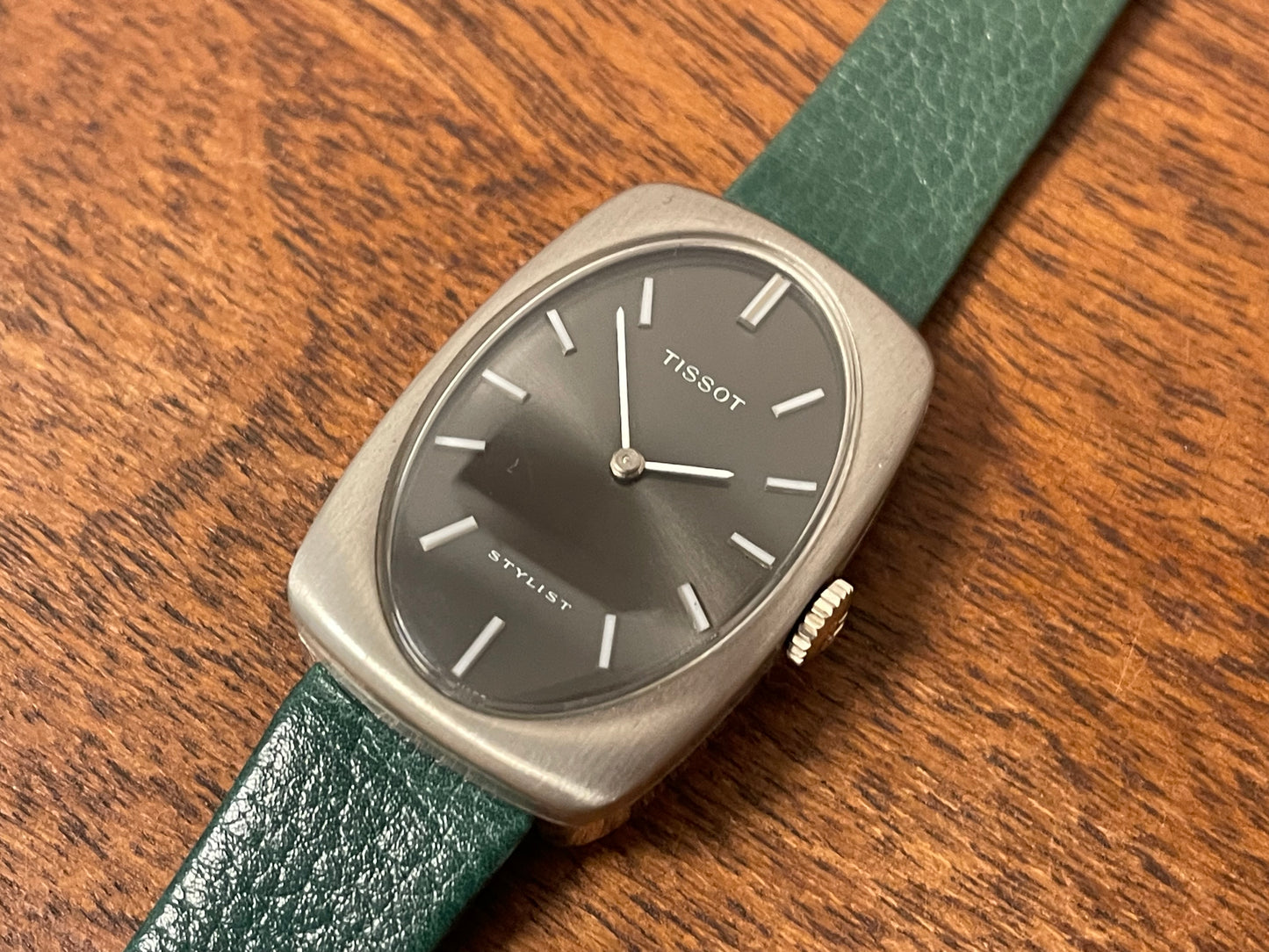 (1970s) Tissot Stylist dress watch - oval grey sunburst dial w/ white stick markers - small size (NOS)