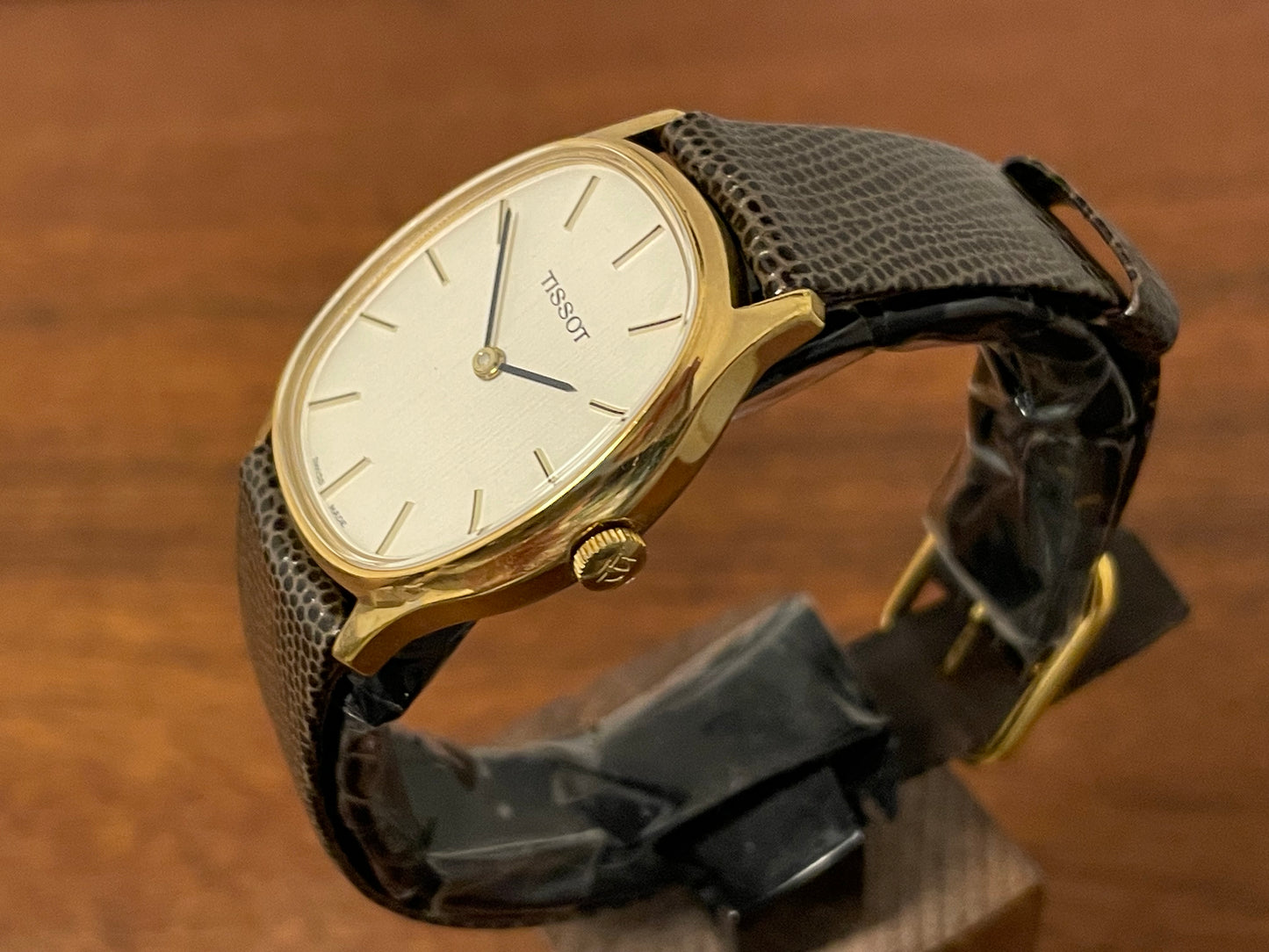 (1970s) Tissot 41141 "Ellipse" dress watch - gold case - silver brushed dial w/ gold stick markers (NOS)