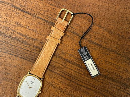 (1985) Pulsar V320-5029 "Ellipse" dress watch - gold case - diamond dust dial (NOS)