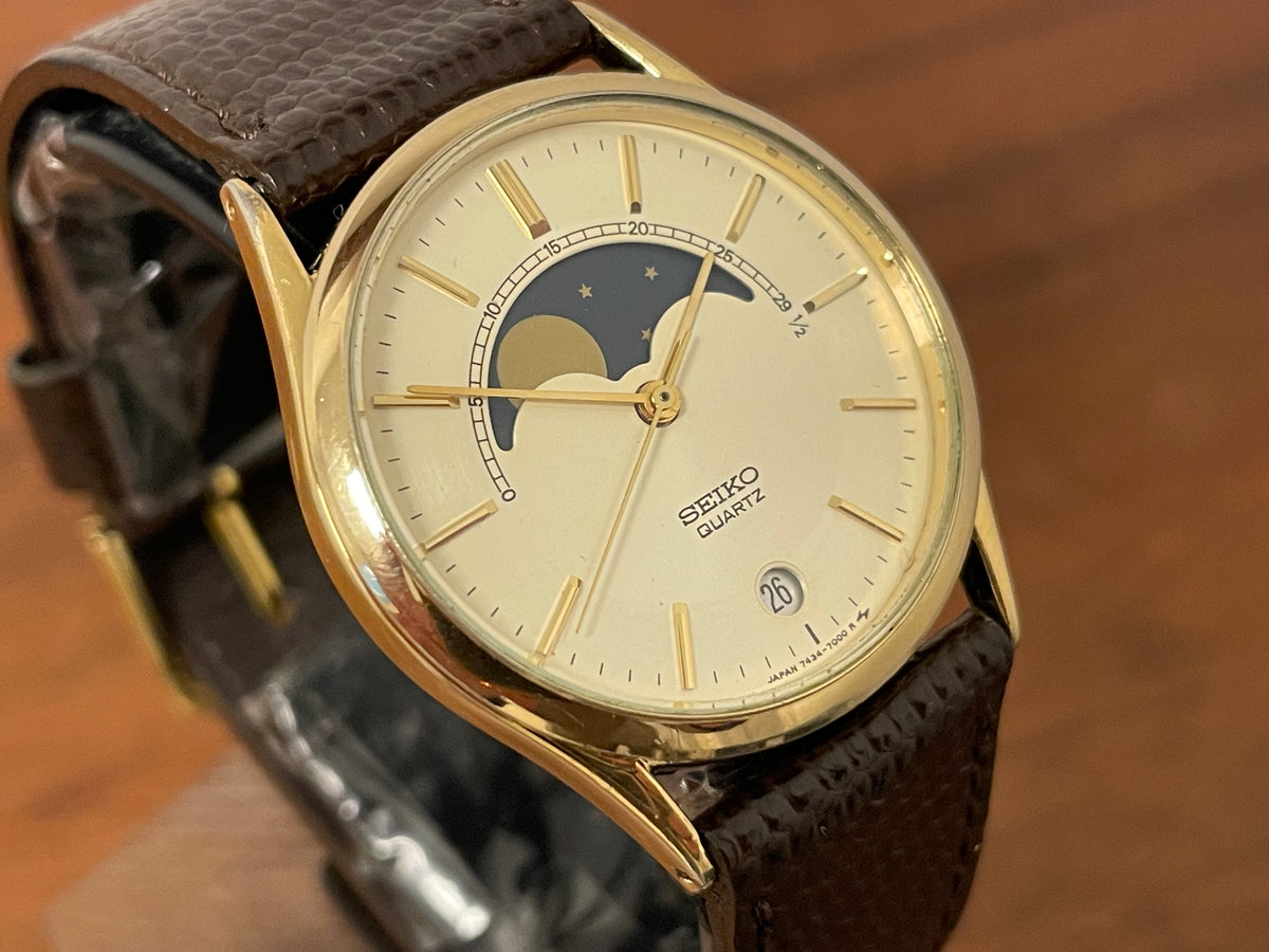 (1984) Seiko 7434-7000 dress watch - champagne dial w/ moonphase & stick markers