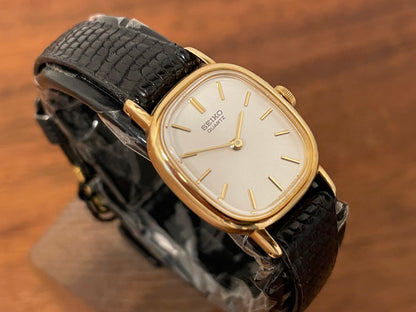 (1981) Seiko 5420-5119 "Ellipse" - gold plated case - silver sunburst dial w/ gold markers - small size (NOS)