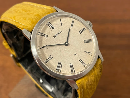 (1976) Seiko 2220-0180 Chariot dress watch - silver textured waffle dial w/ Roman numerals