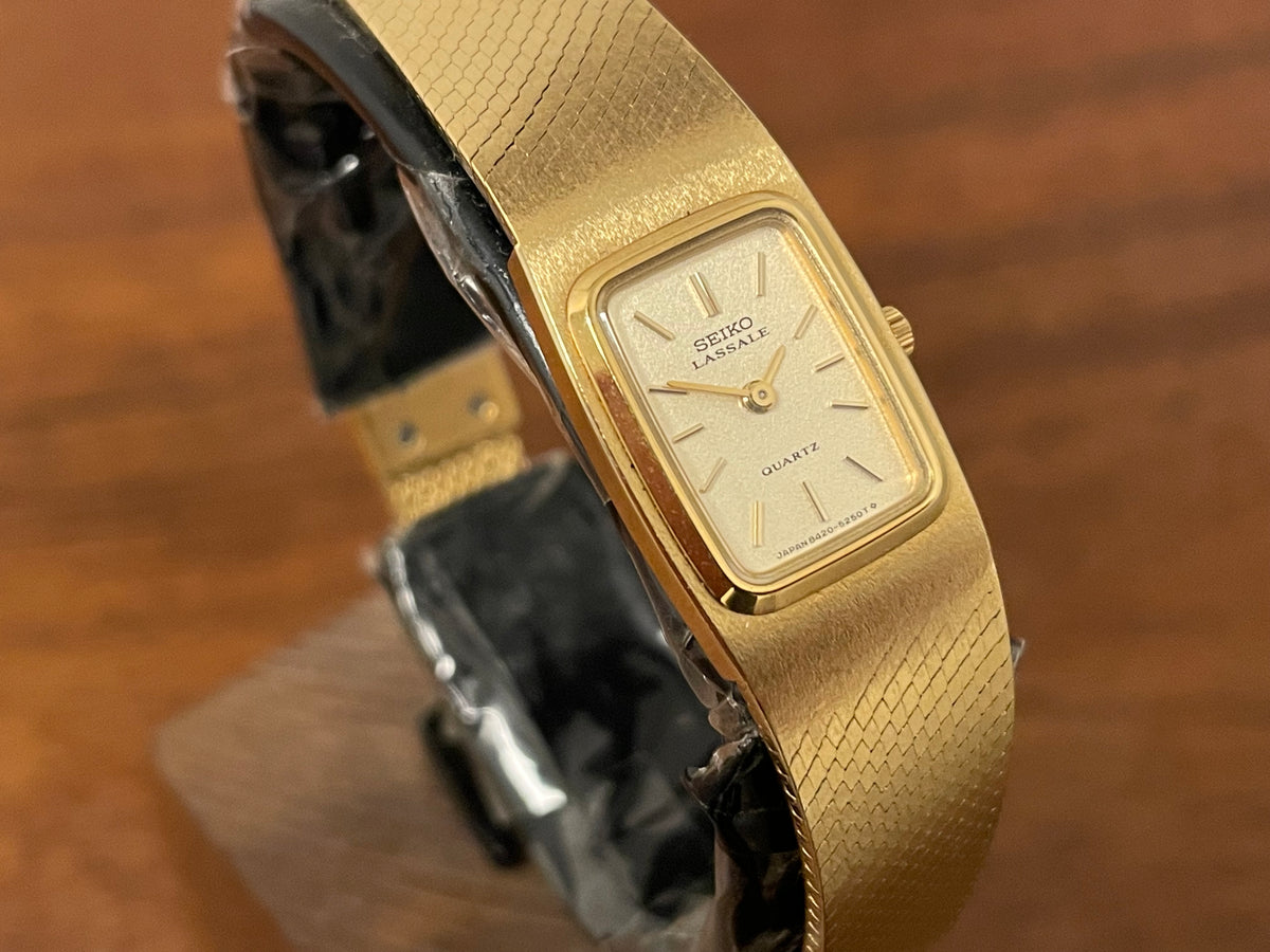 (1981) Seiko 8420-5219 Lassale dress watch - gold integrated bracelet & case - gold dust dial w/ gold stick markers - small size (NOS)