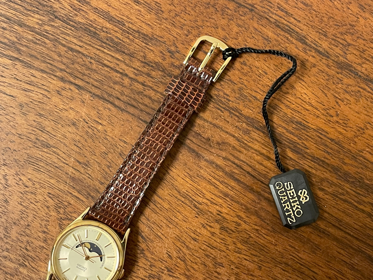 (1985) Seiko 2A24-0040 dress watch - champagne dial w/ moonphase & stick markers - small size (NOS)