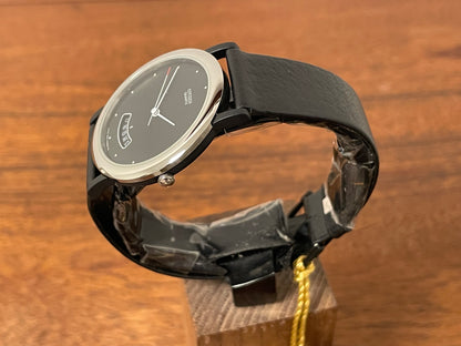 (1989) Citizen QD9022-05E dress watch - black lugs - black dial w/ arc date window (NOS)
