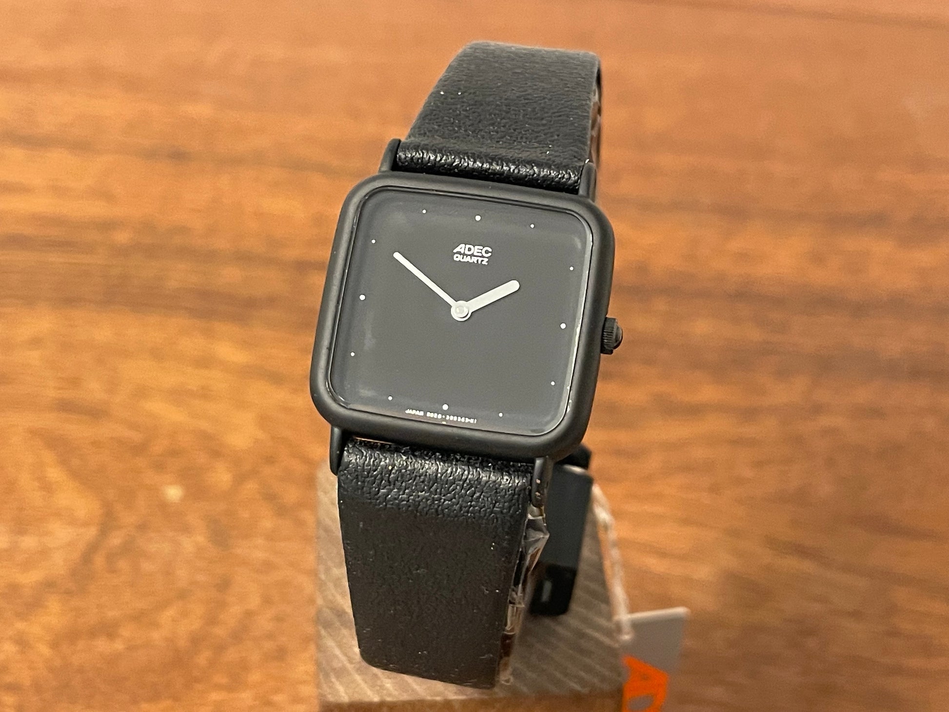 Front side (1983) ADEC (by Citizen) 2028-395808 "TV case" - black case -  black dial w/ silver markers (NOS)