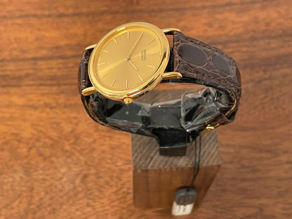 (2004) Seiko 7N00-6A70 dress watch -gold dial w/ gold markers - small size (NOS)