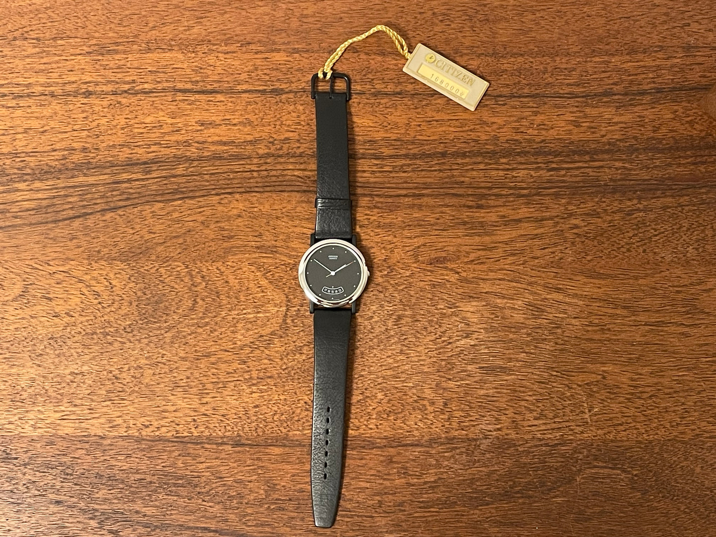 (1989) Citizen QD9022-05E dress watch - black lugs - black dial w/ arc date window (NOS)