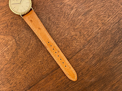 (1977) Seiko 43-0150 14K solid gold dress watch - rope bezel -  gold textured dial w/ gold markers
