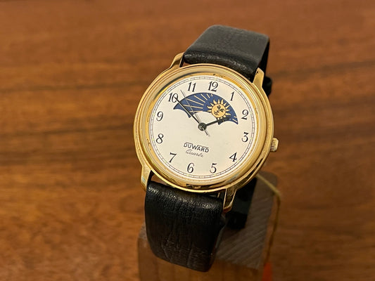 Front view (1980s/1990s) Duward 66052 dress watch - white dial w/ day-night indicator (NOS)
