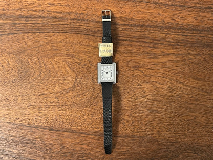 (1970s) Timex "Tank" dress watch - silver case - white dial w/ Roman numerals - small size (NOS)
