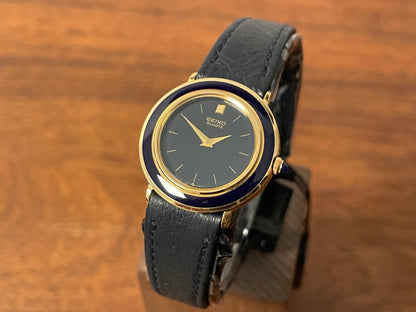 Front side (1983) Seiko 7320-010A dress watch - purple bezel - dark blue dial w/gold markers - small size (NOS)